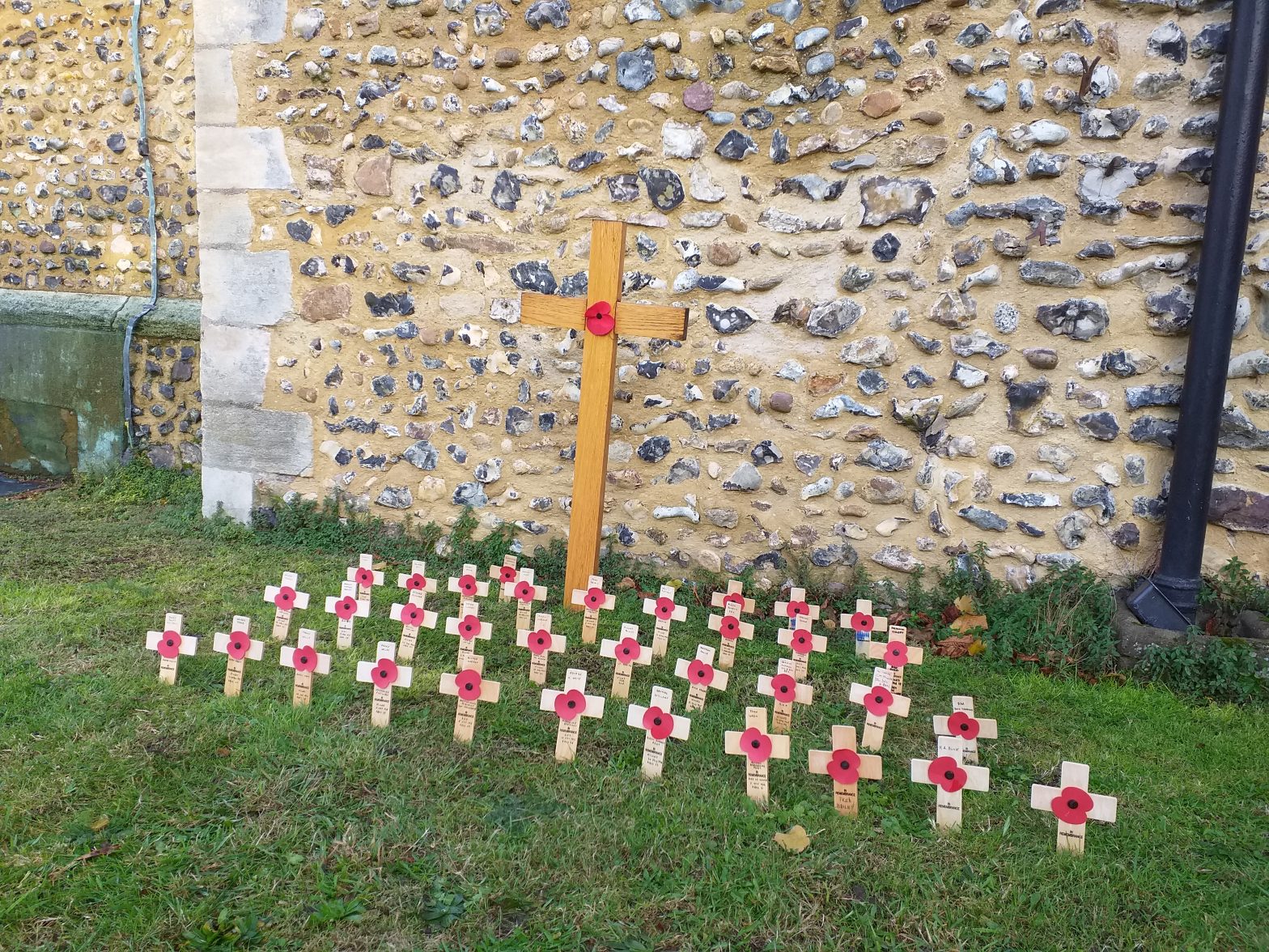 A display of poppy crosses marking Remembrance.
